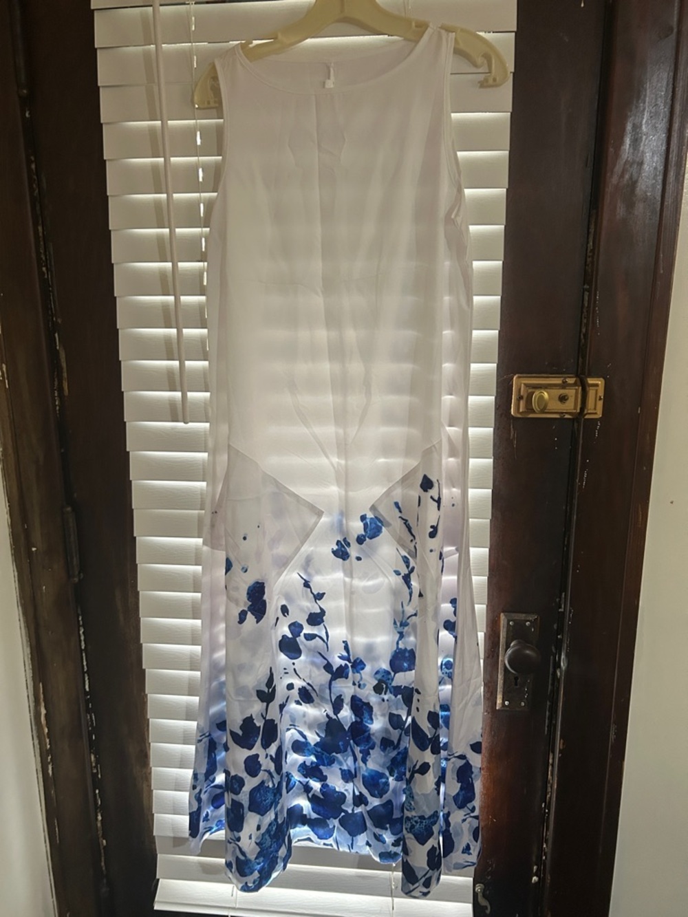 White Sleeveless Midi Dress with Blue Floral Hem